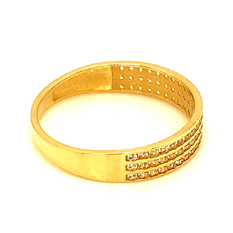 Banda con circones en oro amarillo 10kt.