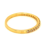 Banda con circones en oro amarillo 10kt.