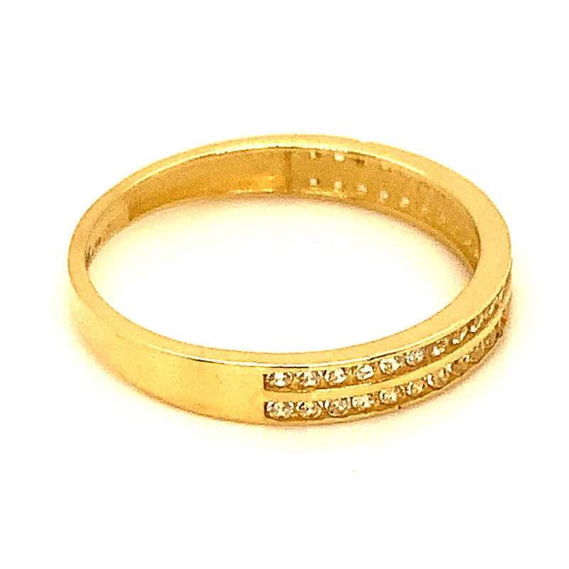 Banda con circones en oro amarillo 10kt.