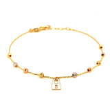 Pulsera (candado con bolitas) en oro tres tonos 10kt. 17/19cm
