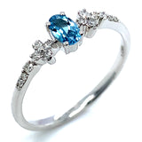 Anillo de Topacio Azul en oro blanco 10kt.