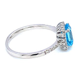 Anillo de Topacio Azul en oro blanco 10kt.