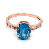 Anillo de topacio azul con diamantes en oro rosado 14k