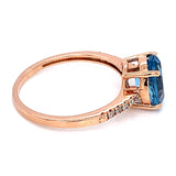 Anillo de topacio azul con diamantes en oro rosado 14k