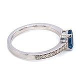 Anillo de Topacio Azul en oro blanco 10kt.