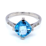Anillo de Topacio Azul en oro blanco 10kt.