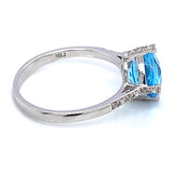 Anillo de Topacio Azul en oro blanco 10kt.