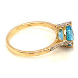 Anillo de topacio azul en oro amarillo 10kt.