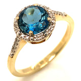 Anillo de topacio azul en oro amarillo 10kt.