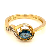 Anillo de topacio azul en oro amarillo 10kt.