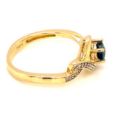 Anillo de topacio azul en oro amarillo 10kt.