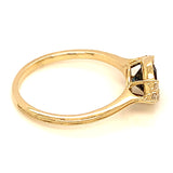 Anillo de topacio azul en oro amarillo 10kt.