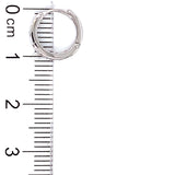 Huggies con circones en oro blanco 18k