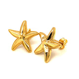 Aretes (estrella de mar) en oro amarillo 18kt.