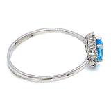 Anillo de Topacio Azul en oro blanco 10kt.