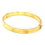 Caña (estilo cartier M) en oro amarillo 10kt.