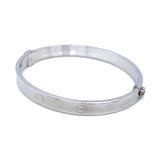 Caña (estilo cartier S) en oro blanco 10kt.