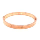 Caña (estilo cartier S) en oro rosado 10kt.