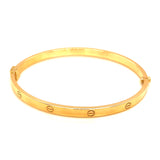 Caña (estilo cartier M) en oro amarillo 10kt.