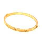 Caña (estilo cartier M) en oro amarillo 10kt.