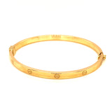 Caña (estilo cartier S) en oro amarillo 10kt.