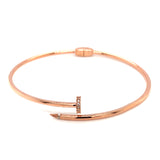 Caña (clavo) con circones en oro rosado 10kt.