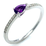 Anillo de amatista con diamantes en oro 14kt.
