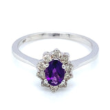 Anillo de amatista con diamantes en oro blanco 10kt.