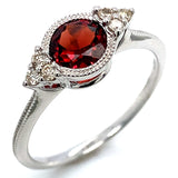 Anillo de granate en oro blanco 10kt.