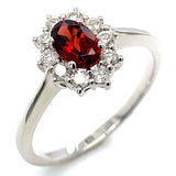 Anillo de granate en oro blanco 10kt.