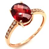 Anillo de granate con diamantes en oro rosado 14kt.