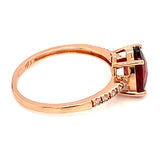 Anillo de granate con diamantes en oro rosado 14kt.