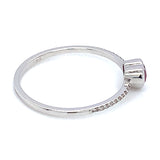 Anillo de rubí con diamantes en oro blanco 14kt.