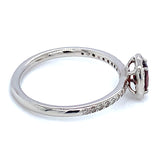 Anillo de granate con diamantes en oro blanco 14kt.