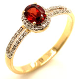Anillo de granate con diamantes en oro amarillo 14kt.