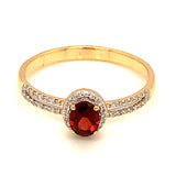 Anillo de granate con diamantes en oro amarillo 14kt.