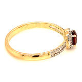 Anillo de granate con diamantes en oro amarillo 14kt.