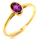 Anillo de amatista en oro amarillo 14kt.