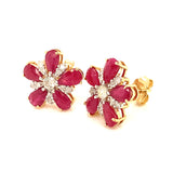 Aretes de rubí con diamantes en oro amarillo 14kt.