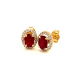 Aretes de rubí con diamantes en oro amarillo 14kt.