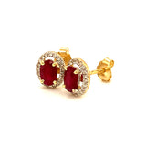 Aretes de rubí con diamantes en oro amarillo 14kt.