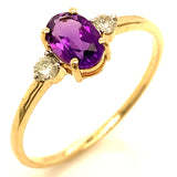 Anillo de amatista con diamantes en oro amarillo 14kt.