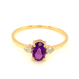 Anillo de amatista con diamantes en oro amarillo 14kt.