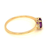 Anillo de amatista con diamantes en oro amarillo 14kt.