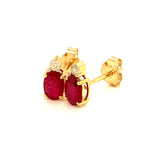 Aretes de rubí con diamantes en oro amarillo 14kt.