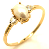 Anillo de perla con diamantes en oro amarillo 14kt.