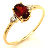 Anillo de granate con diamantes en oro amarillo 14kt.