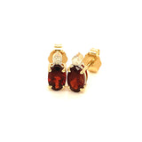 Aretes de granate con diamantes en oro amarillo 14kt.