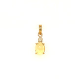 Dije de ópalo con diamantes en oro amarillo 14kt.