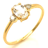 Anillo de topacio blanco con diamantes en oro amarillo 14kt.